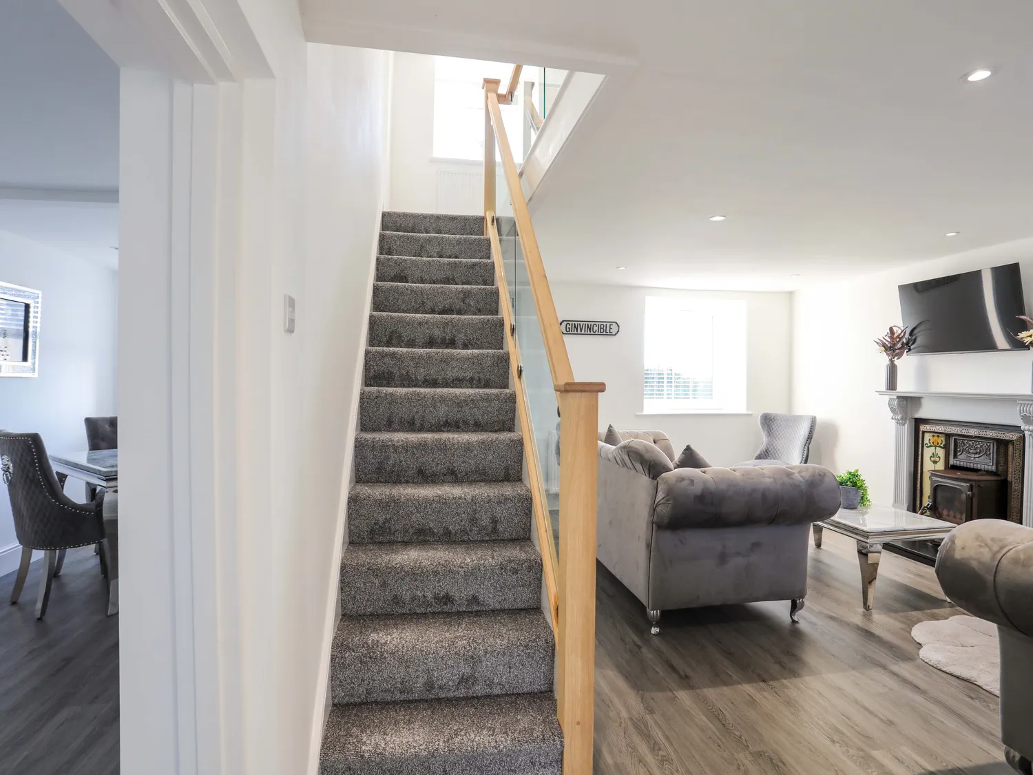 Staircase and living space at Tyn Fridd